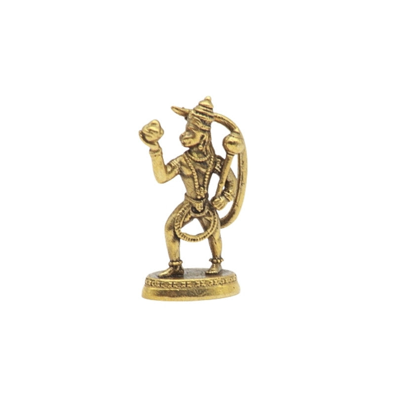 Brass statue of  Hanuman on a white background