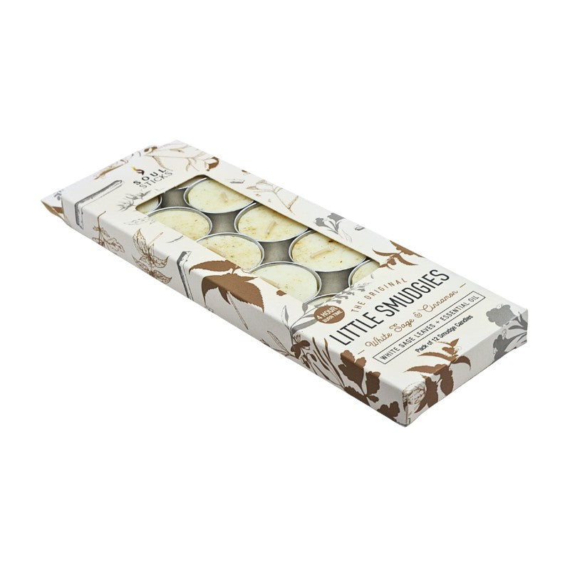 Box of Little Smudgies with tea light candles on a white background