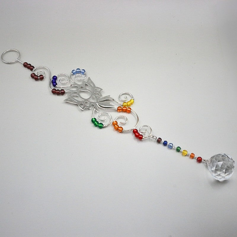 decorative hanging ornament with coloured beads on a white background