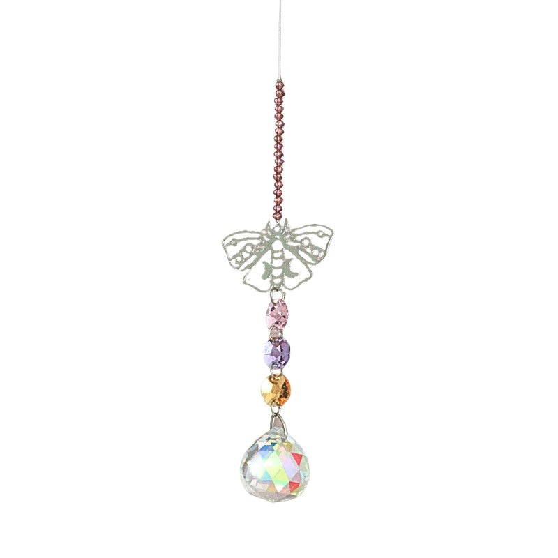 Decorative hanging crystal with colorful beads on a white background