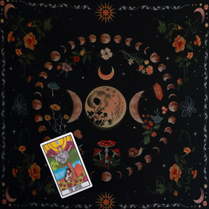 Tarot card  laid out on a floral  tarot cloth 