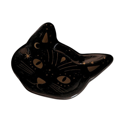 Black cat-shaped dish with brown details on a white background