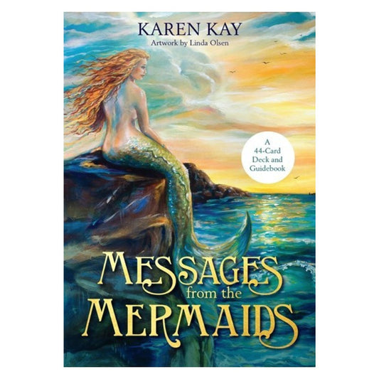 front cover of the box for Messages from the Mermaids oracle deck featuring a mermaid sitting on a rock looking at the ocean