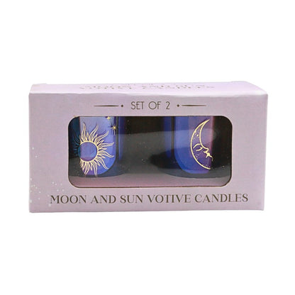 Set of 2 moon and sun votive candles in packaging on a white background