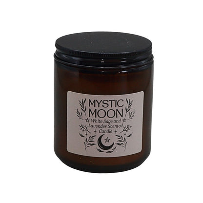 Mystic Moon candle in amber jar with black lid on a white background