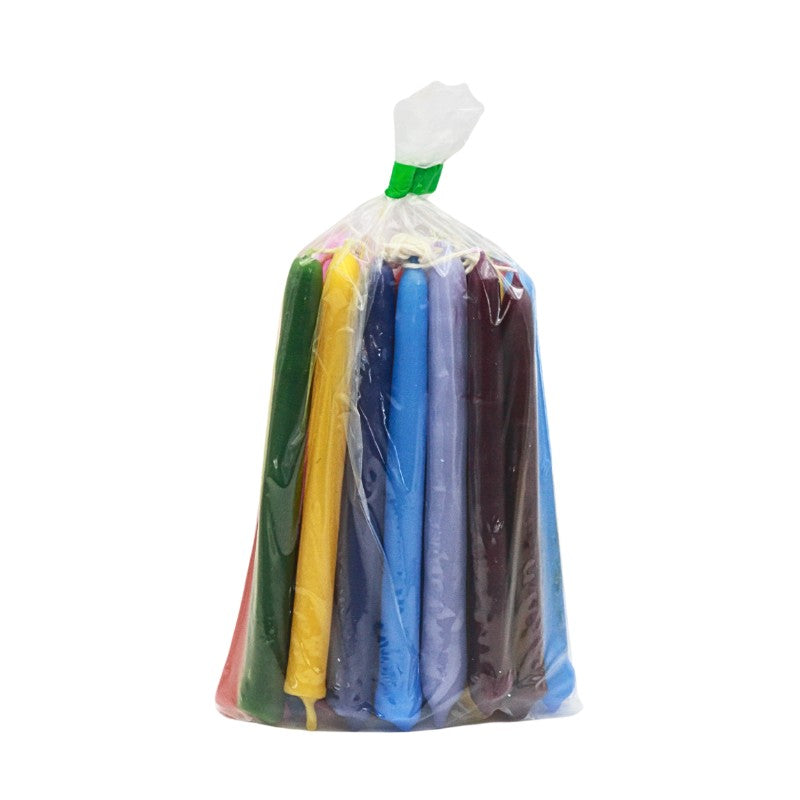 Packaged colourful candles on a white background