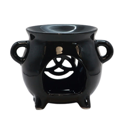 black ceramic cauldron oil burner with a triquetra shape cut out on the front