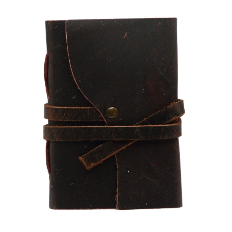 Oiled leather journal with a leather strap
