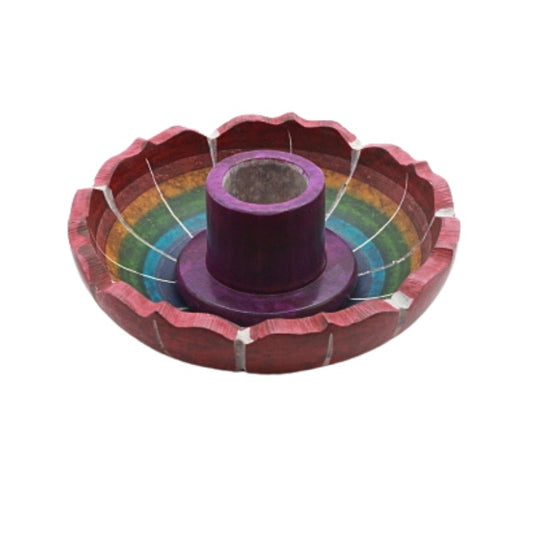 Colorful palo santo and candle holder with a purple center on a white background