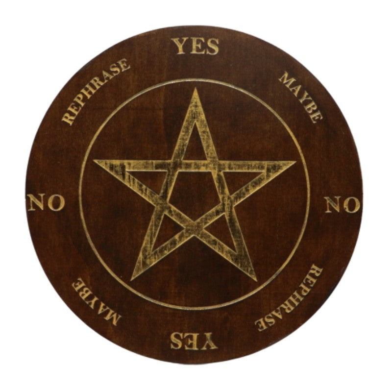 round wooden board with a pentagram star painted in gold in the centre with yes, no answers painted around the edges