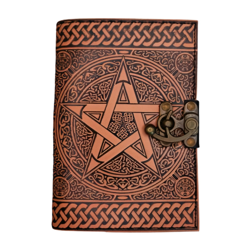 front of a leather journal- light brown with a pentacle on the cover and a swivel lock