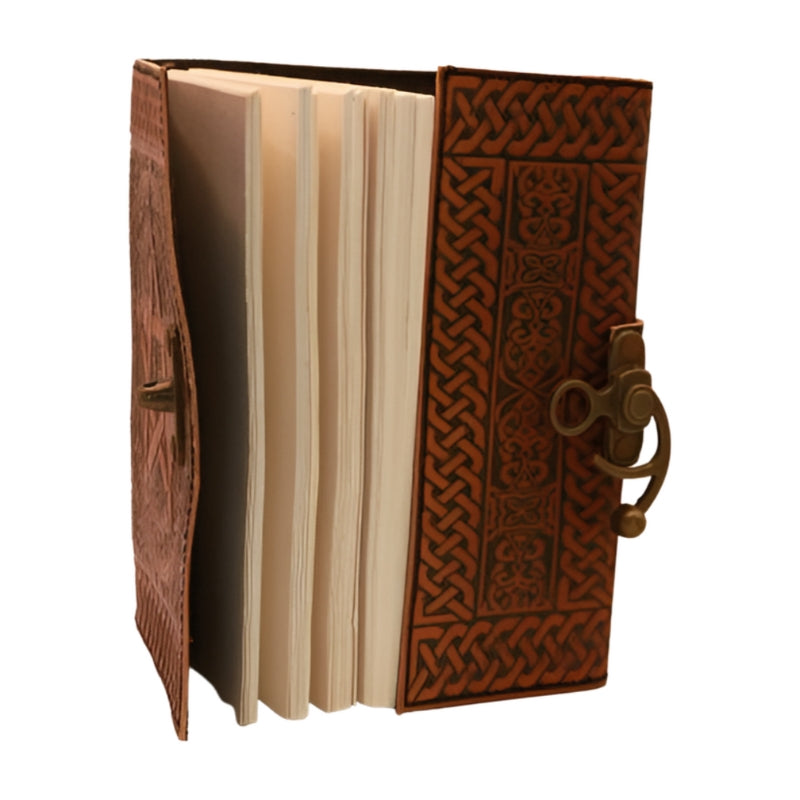 inside view of a leather journal- light brown with a pentacle on the cover and a swivel lock