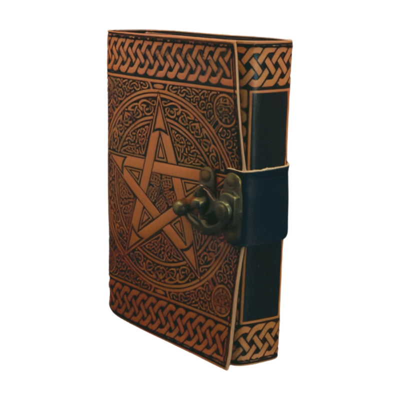 side of a leather journal- light brown with a pentacle on the cover and a swivel lock