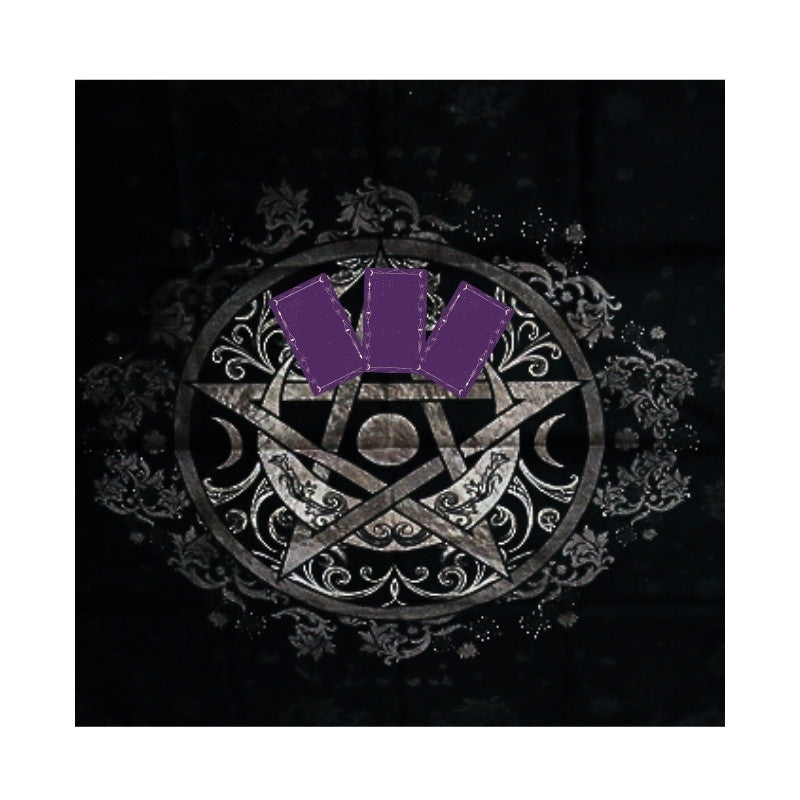 black tarot cloth with a pentacle design on front and purple tarot cards laid on top