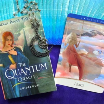 Quantum Oracle- box next to the 'peace' card from the deck