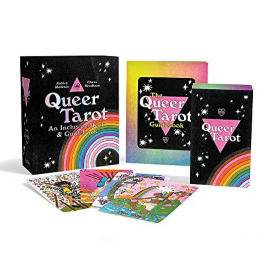 brightly colour tarot set "queer tarot" showing cards laid out with the guidebook and box