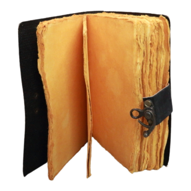 inside leather journal showing distressed pages