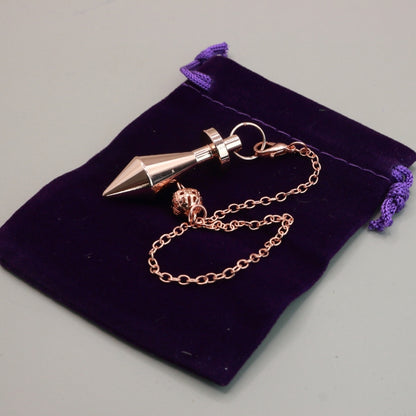 Rose Gold Pendulum On Purple Velvet Bag