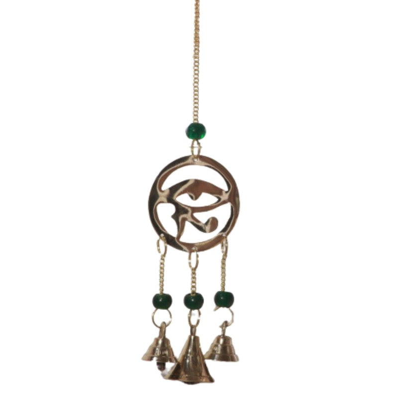 brass wind chime - 3 bells hanging from a central circle- an eye symbol in the centre of the circle