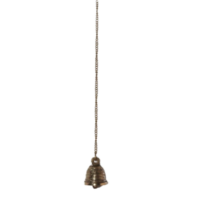 Gold coloured embellished brass bell hanging from  chain