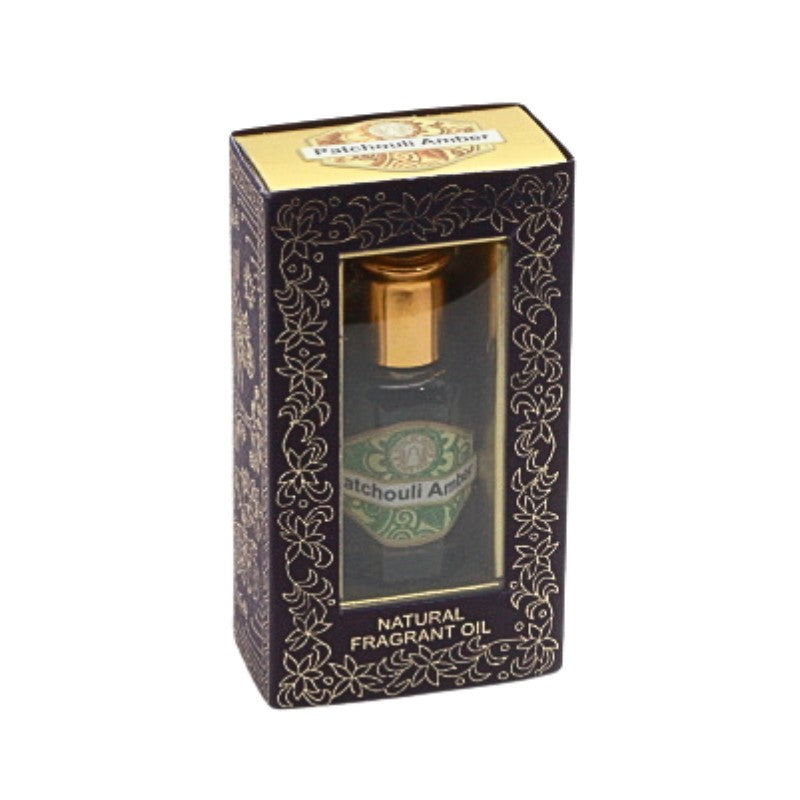 Bottle of perfume oil in a decorative box on a white background