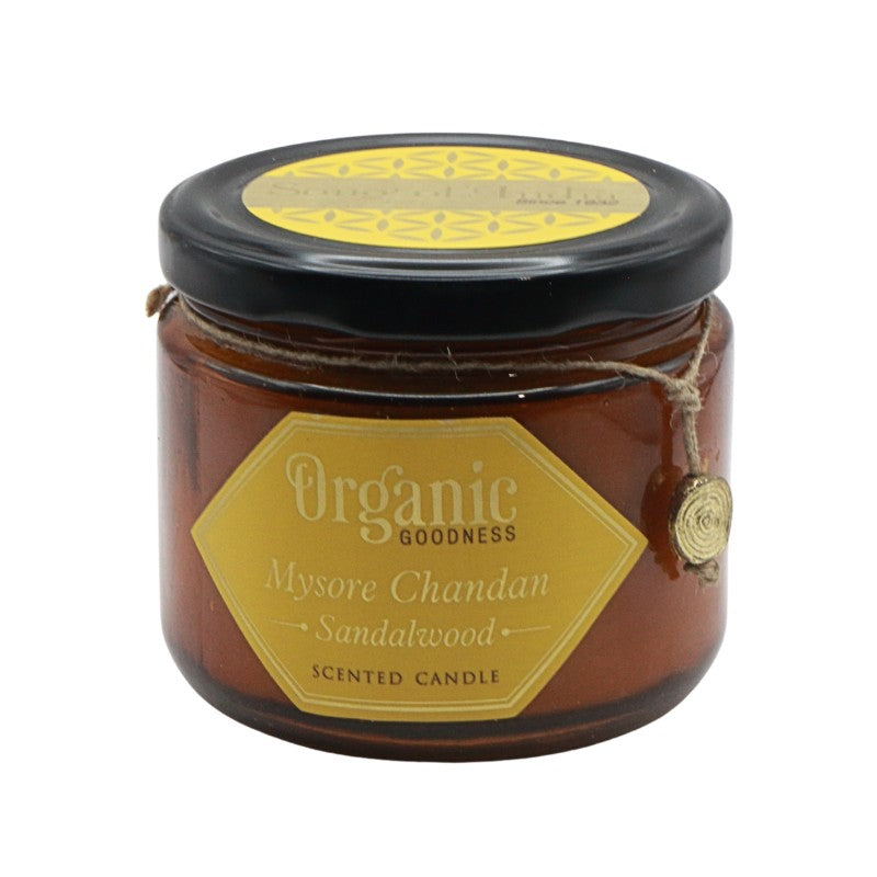 jar candle with yellow label on white background