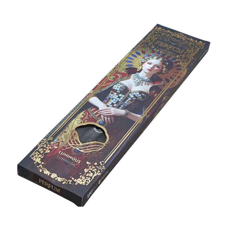 Perfume incense  packaging with decorative design and portrait of a woman on a white background
