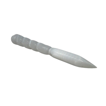 Clear stone tool on a white background