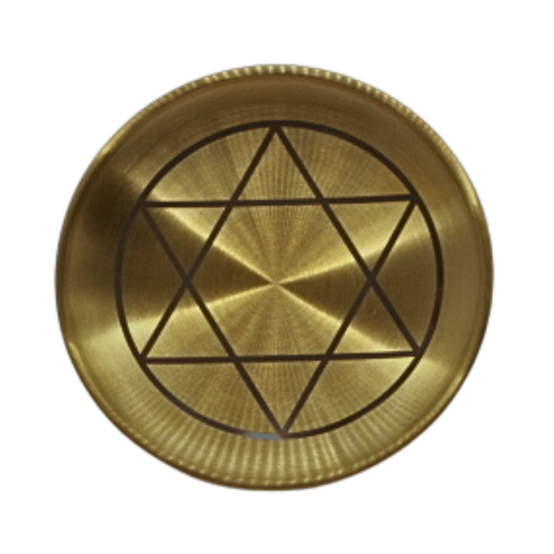 Gold circular object with star of david design on a white background