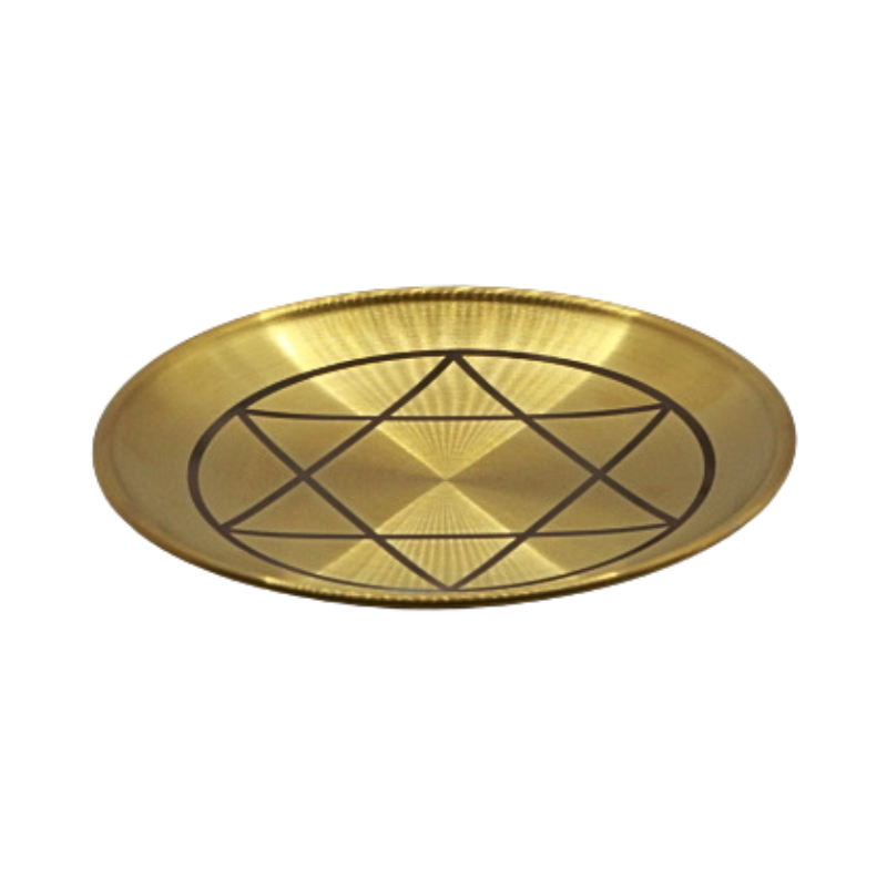 Gold tray with a star design on a white background