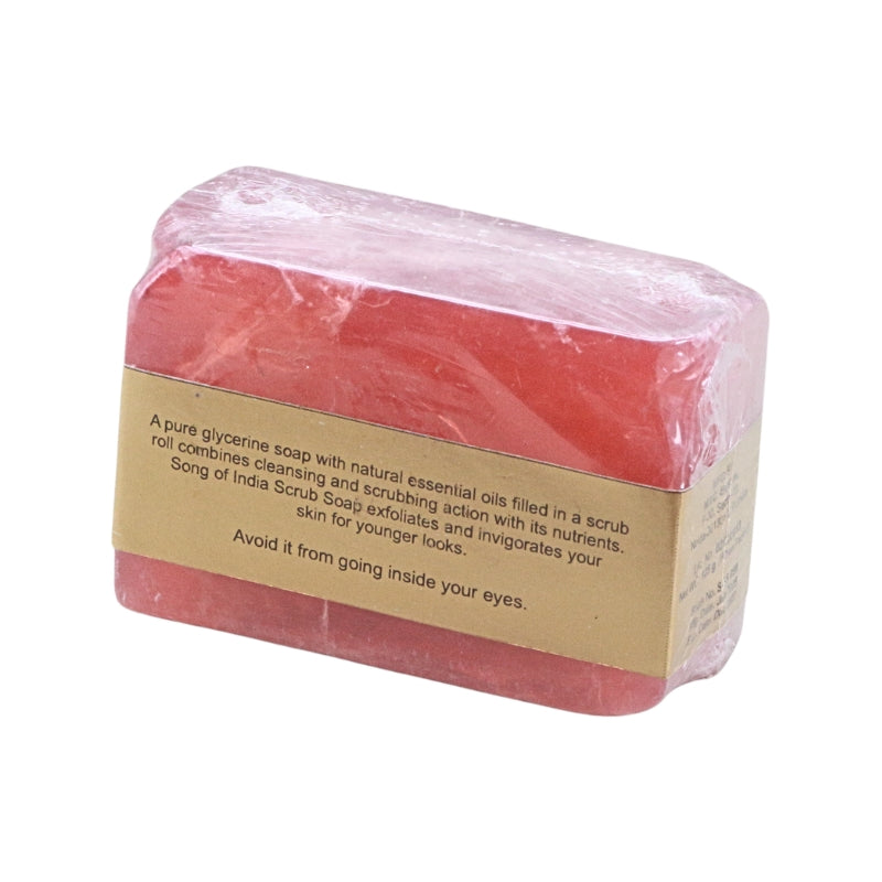 A rectangular bar of pink soap wrapped in clear plastic with a tan paper label, shown on a plain white background.