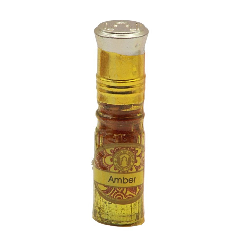 small perfume bottle with gold lid by Song Of India