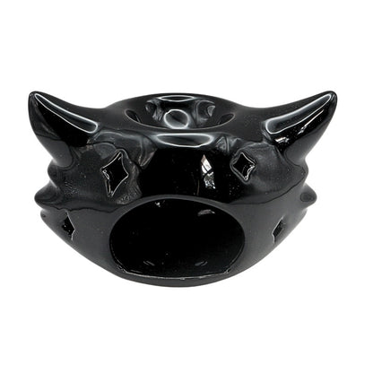black ceramic oil burner in the shape of a cats head