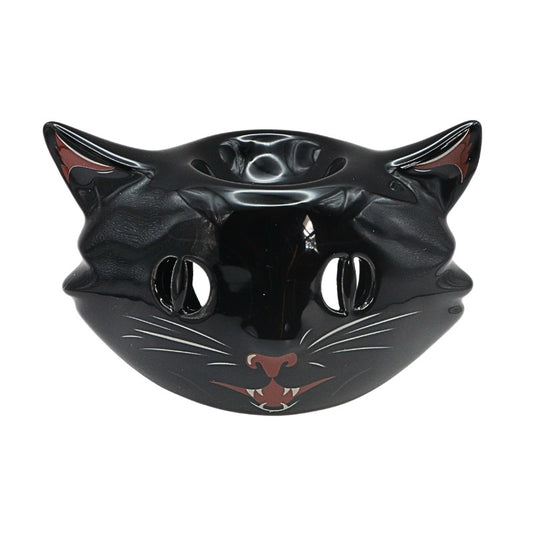 black ceramic oil burner with a cat face on front