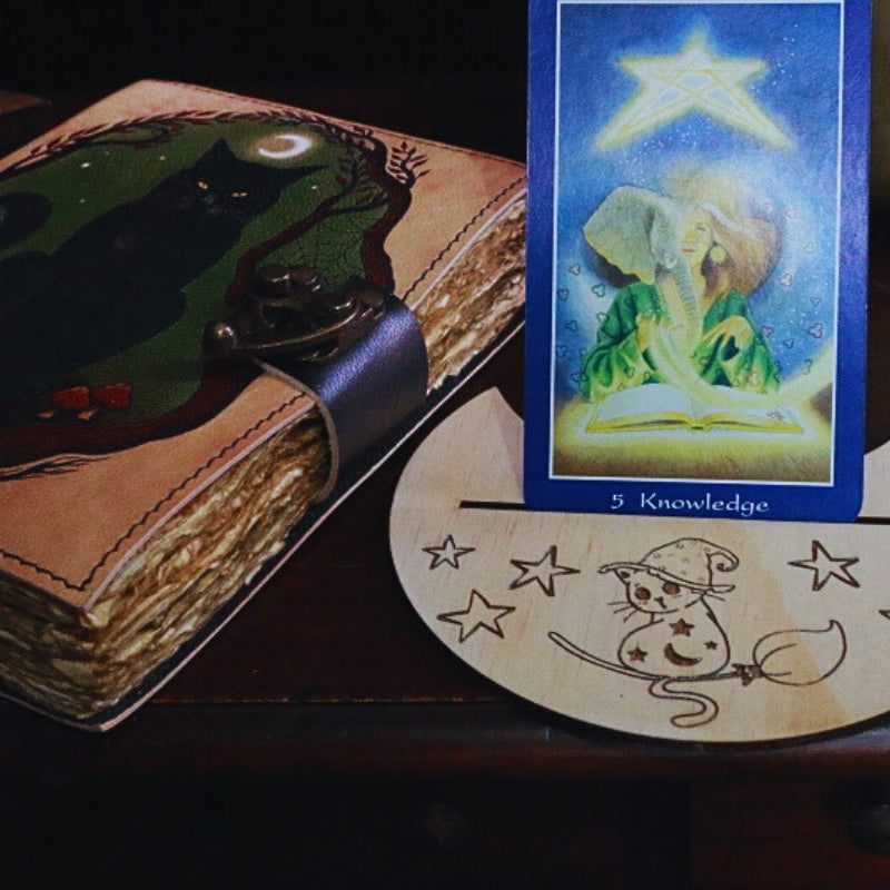 Handmade Magic Cat Tarot Card Holder next to a magic cat journal