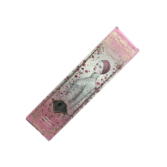 Decorative incense box with artistic design on a white background