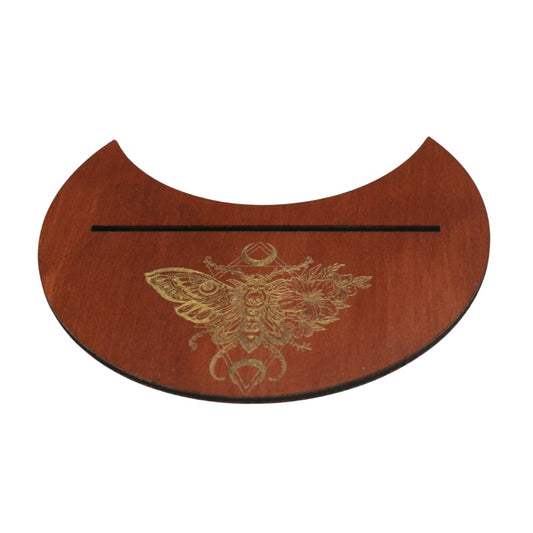Wooden tarot card holder with butterfly design on a white background