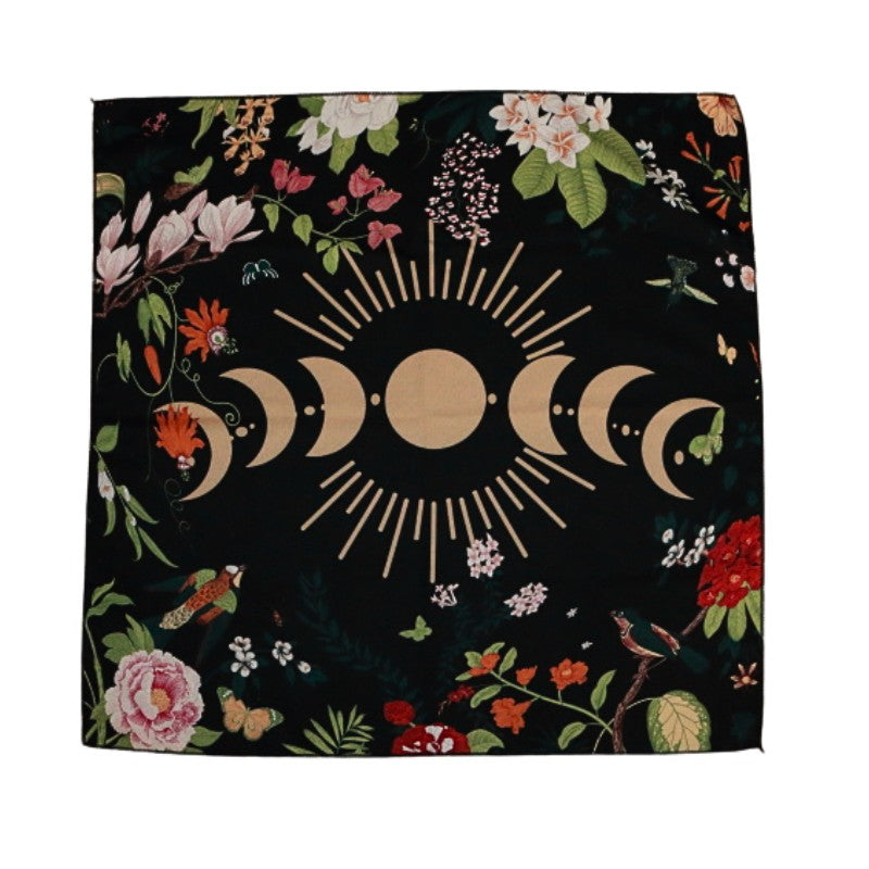 black tarot cloth with gold moon phases and floral design