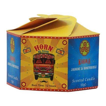 yellow and blue candle box with a colourful bus on the front