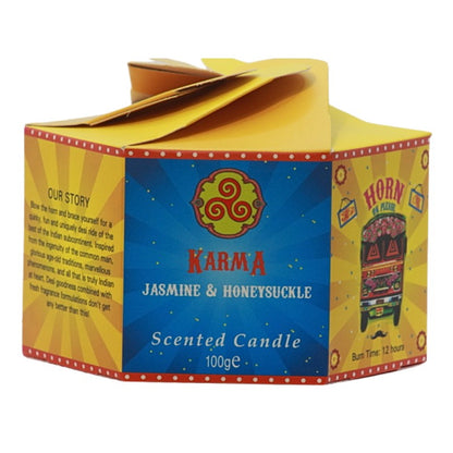 yellow and blue candle box with a colourful bus on the front