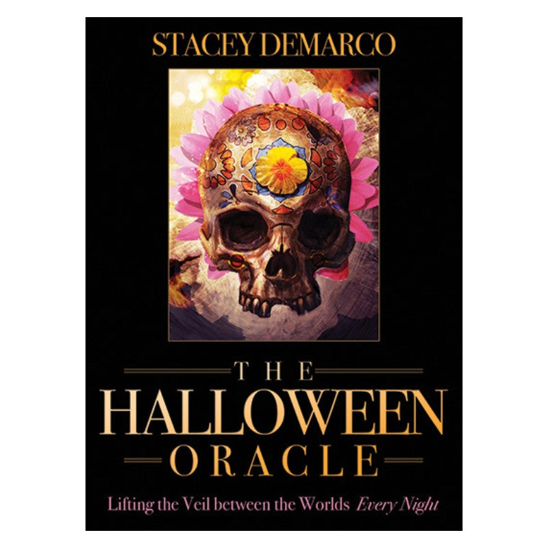 front cover of the halloween oracle featuring a skull decorated with flowers