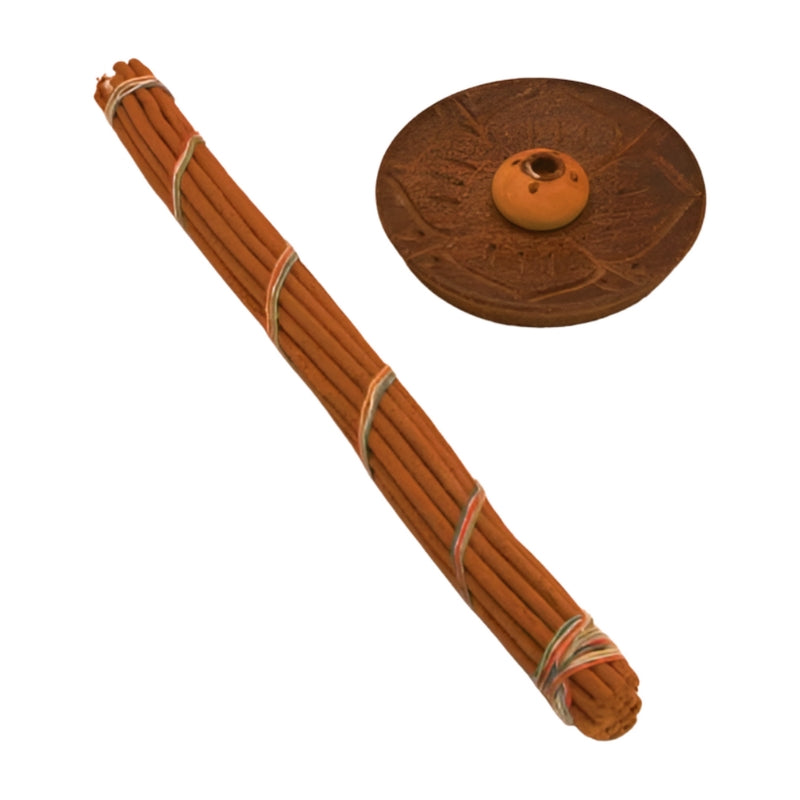 Round wooden carved incense holder- dark wood  next to a bundle of hand rolled tibetan in cense sticks