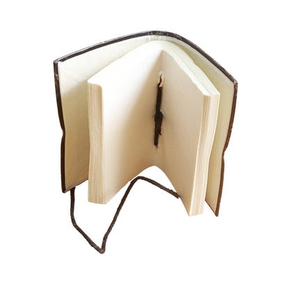 open notebook with blank pages and a brown tie, on a white background