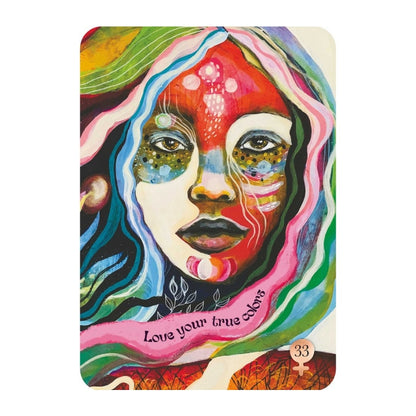 A colourful card featuring a stylized portrait of a woman's face with vivid red, pink, blue, green, yellow, and orange tones. The artwork includes the text 'Love your true self' and a small '33' in the lower right corner, shown on a plain white background.