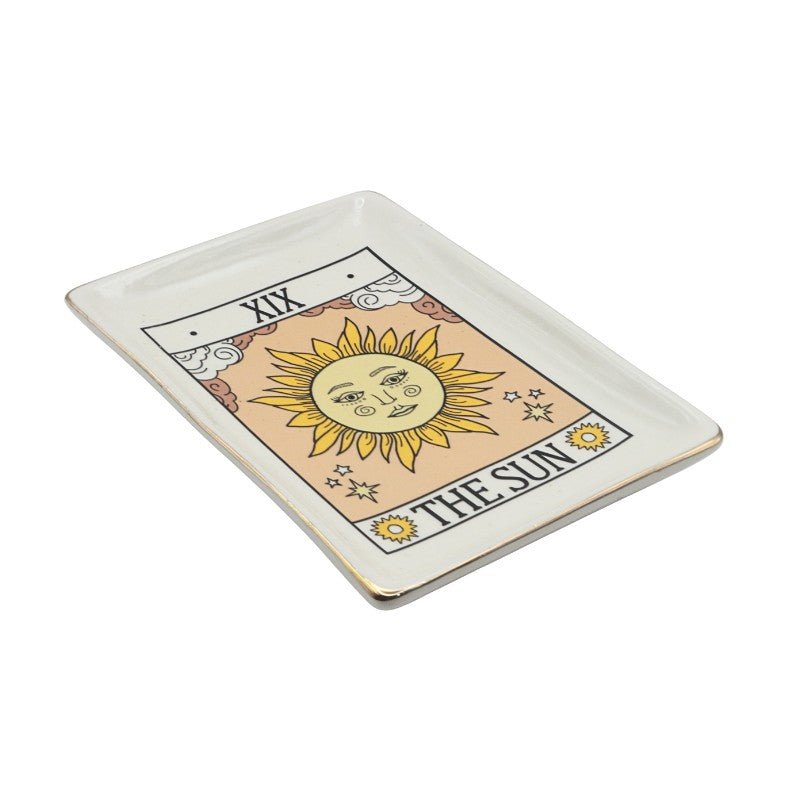 Decorative tray with 'The Sun' tarot card design on a white background