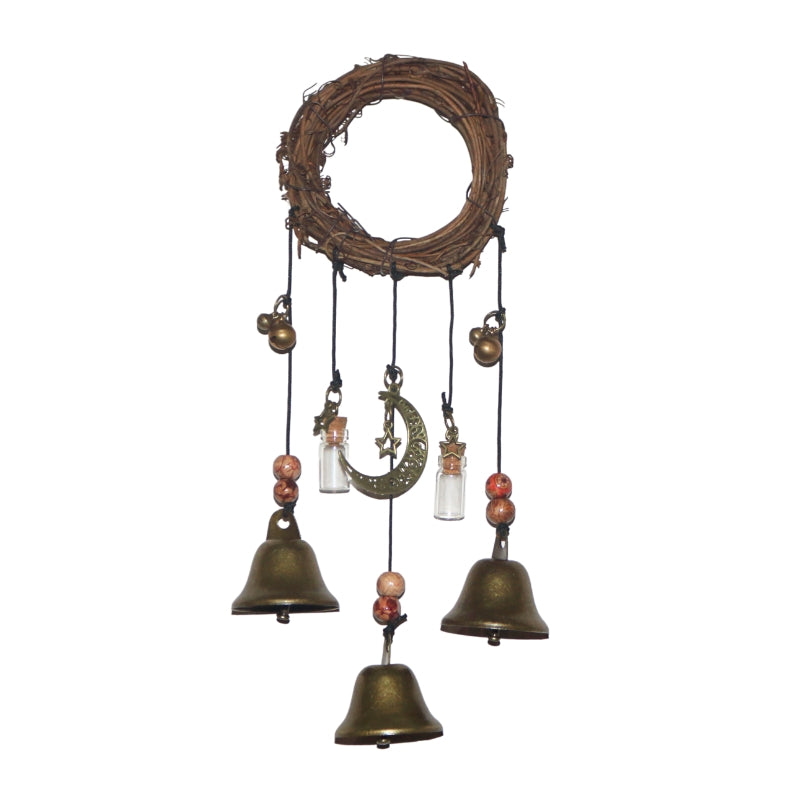 witches bells  consisting of a wreath with 3 brass bells attached by black string and beads.