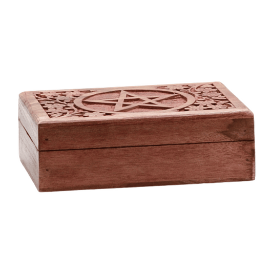 carved wooden box with a pentacle engraved on the top