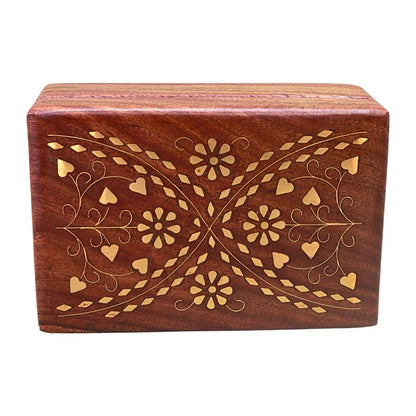 A rectangular wooden keepsake box with a reddish-brown finish and gold floral inlay patterns on the lid, shown against a plain white background.
