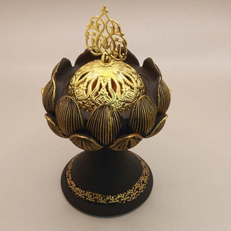 black and gold resin lotus incense holder on stand