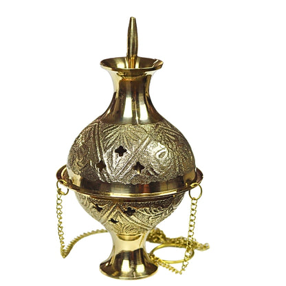 A gold-colored embossed brass incense burner with chains, featuring geometric patterns and a top handle for hanging.